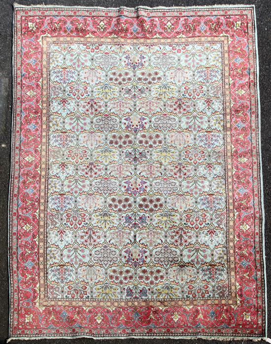 A Kirman carpet, 11ft 3in by 8ft.